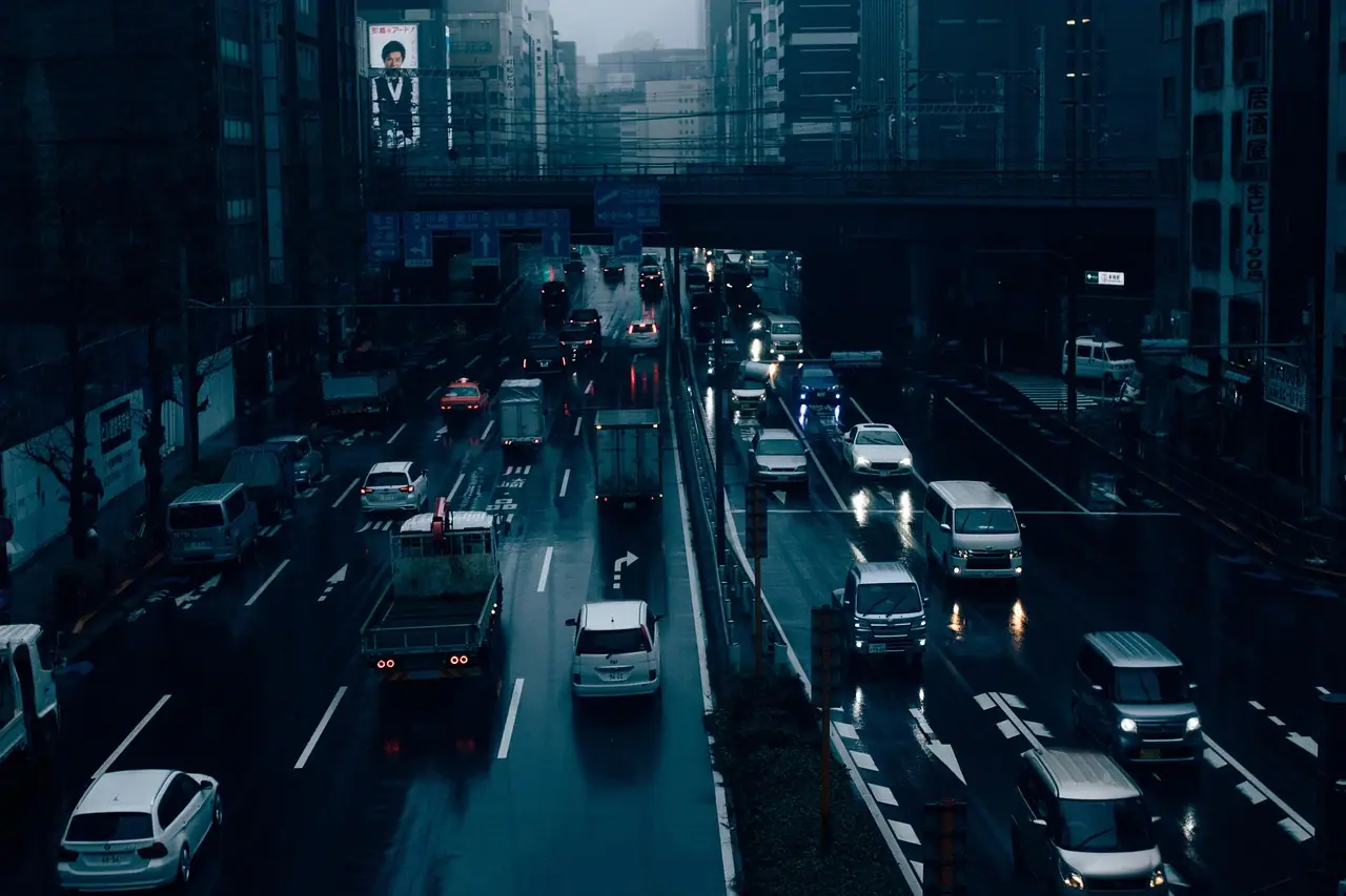 Traffic on a multi-lane Tokyo avenue at dusk